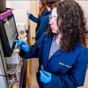 Image of student working on science experiment